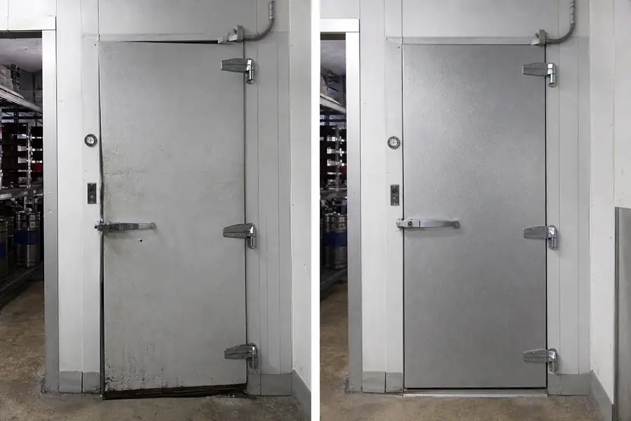 Editorial hero photograph for a commercial foodservice refrigeration article titled “Longmont Brewery Walk-In: Resealing a Door That Never Stopped Moving.” Show Before and after of the door. Relevant equipment: Walk-in cooler, keg cooler or merchandiser per the real job. Relevant manufacturers when naturally visible: Per the real job, likely Kolpak, Nor-Lake or Beverage-Air. Use an authentic restaurant, grocery, school-kitchen or foodservice setting, natural practical lighting, realistic wear and materials, documentary composition, no staged corporate poses, no added text, 16:9 landscape. When the brief requires technical proof, publication should use a real job-site photo instead of an invented representation.